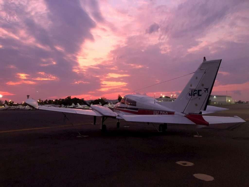 JFC Cessna 310 at sunset on a WA airstrip